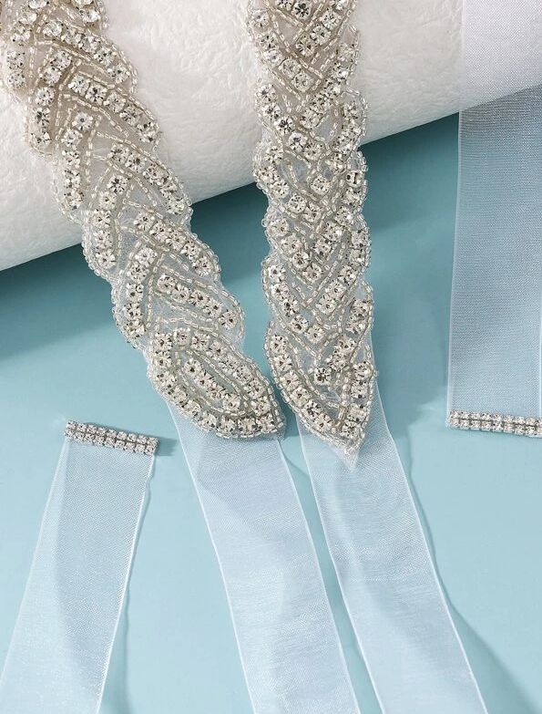 Close do bordado artesanal de luxo cinto de noiva