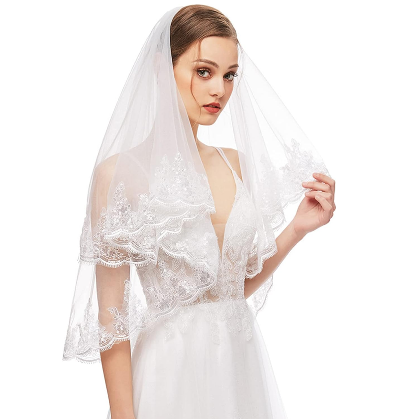 Véu de noiva com brilho de paetê na borda em tule transparente